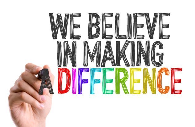 ASI Consulting Hand with marker writing We Believe in Making a Difference 
